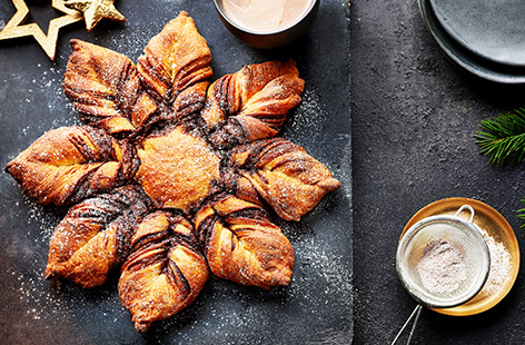 This stunning loaf is layered with hazelnut chocolate spread and twisted into a star shape