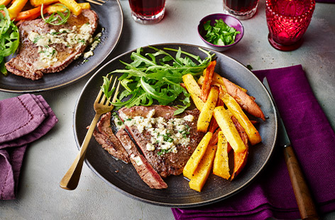 Treat your loved one to an extra-special meal this Valentine’s Day. Tender steak is topped with blue cheese butter and served with homemade chips for a restaurant-quality meal that’s kind on the wallet.