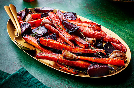 This colourful, flavour-packed side is a star supporting act for Christmas lunch or any Sunday roast. Carrots and beetroot are coated in balsamic vinegar and roasted until golden and sticky – simple yet impressive! 