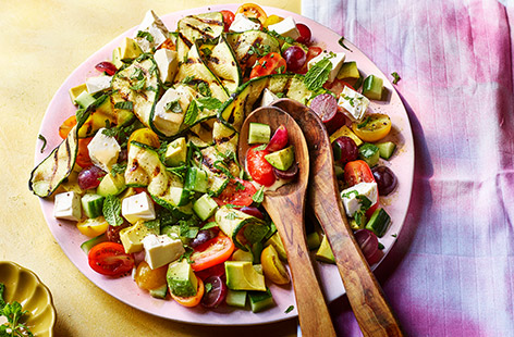 This simple salad is packed with freshness, making it the perfect barbecue side dish. Grilling the courgettes adds smokiness, which pairs perfectly with salty feta and juicy tomatoes. Drizzle over a zingy mint and mustard dressing and revel in those sunshine flavours.  