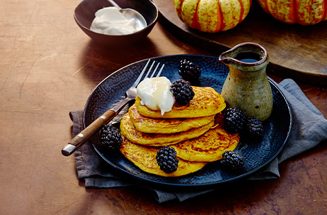 These seasonal pancakes use pumpkin to give them a warm glow and sweet, squashy flavour.