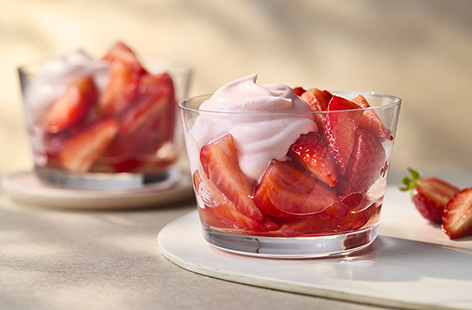 This elegant summer dessert gives classic strawberries and cream a grown-up twist. Creamy rosé syllabub is easy to whip together and is paired with juicy macerated strawberries, soaked in a sweet and boozy rosé syrup.
