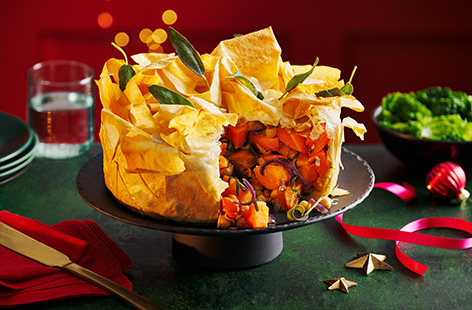 This festive filo pie is a fantastic vegan option for your Boxing Day celebrations. With sweet potatoes, chickpeas and crispy sage, this pie tastes great alongside steamed leafy greens.