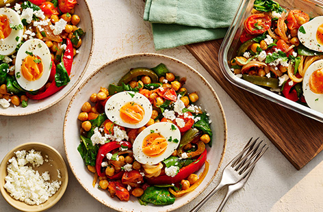These egg pots are a super-easy snack to prepare for the week ahead. Roasted chickpeas and tomatoes are topped with feta and a jammy egg for a protein hit.​ ​They also count towards 2 of your 5-a-day and are way more colourful than a cereal bar.