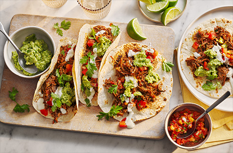 Toasted aromatic spices and succulent beef brisket are slow-cooked to create these juicy tacos that the whole family will love. They are definitely worth the wait!