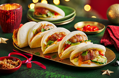 If you like pigs in blankets then you'll love these bao buns. Stuffed with crispy pigs in blankets, crunchy cucumber and sriracha mayo, these easy buns make the perfect canapé for your Christmas party.