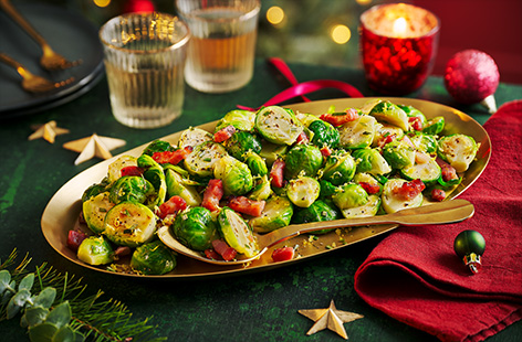 Try cooking your sprouts in the air-fryer this year to get them super crispy. Cook with lardons, nutmeg and rosemary for festive flavours, then serve alongside all the trimmings.