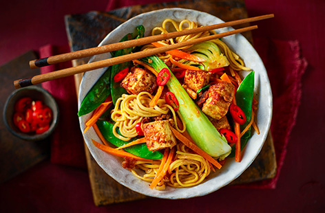 This tasty 20-minute dinner for one will cure your winter blues. Noodles are coated in an indulgent nutty sauce and mixed with tofu and vibrant veg. Use frozen ginger and garlic so you can enjoy fragrant flavours while reducing your food waste. 