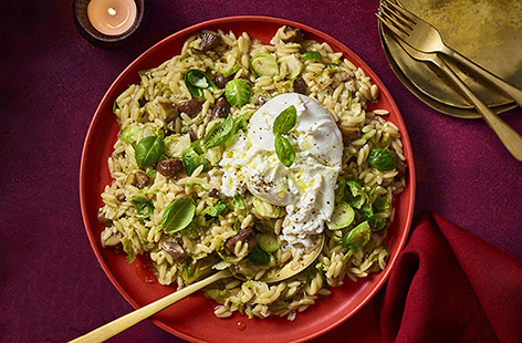 Silky and comforting, this orzotto recipe is full of flavour with Brussels sprouts, chestnuts and creamy burrata. A festive vegetarian pasta dish you’ll want on repeat!