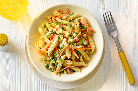 This quick and easy lunch is vegan! Pasta is coated in lemon-infused houmous and mixed with an assortment of colourful veggies for the ultimate kid-friendly lunch.