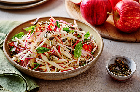 Fresh, crunchy and tangy, a good slaw is a star side that can transform a simple dish into something special, from a hearty chilli to barbecued meats and fish. This fruity, fragrant recipe ticks all the boxes, with sweet, crunchy Gala apples, toasted seeds and refreshing mint.