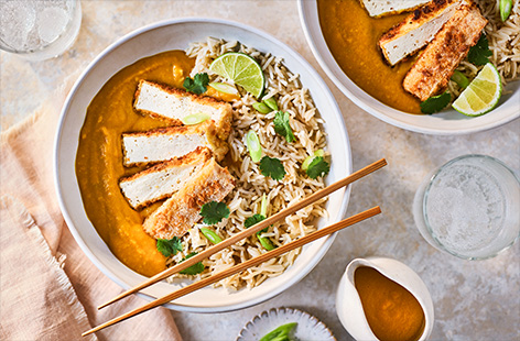 Learn how to recreate the iconic katsu curry at home with this simple recipe. We've replaced chicken with crispy tofu for a delicious vegan twist. Serve with fluffy rice and a squeeze of lime juice for big fakeaway flavours. 