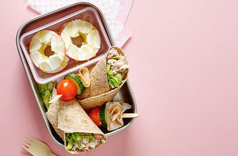 Make your kids a lunchbox that really has it all – creamy tuna and cream cheese wrapped up with crisp lettuce, chicken and veg skewers and sweet apple and honey rounds