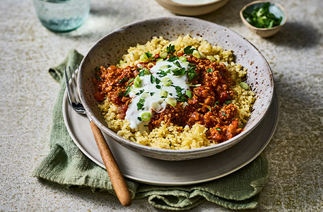 We've used a meat-free mince spiked with harissa paste to make a rich veggie ragu, served on top of a bed of bulgur wheat to continue the Middle Eastern-inspired theme. An interesting and budget-friendly family dinner.