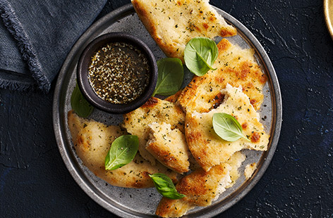 A super simple snack recipe that brings restaurant-quality nibbles to your home, this pimped up olive oil – with za'atar and garlic – is a failsafe idea when entertaining guests.