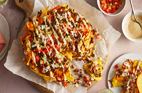 These loaded nachos make a great match day snack, perfect for sharing with friends. Topped with crispy mince, plenty of cheese and a homemade burger sauce, they're undeniably moreish! If you don't have an air-fryer, see our tip below on how to make them using your oven.