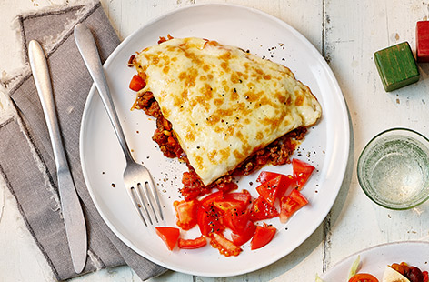 There's just 30 minutes between you and this oh-so-easy lasagne recipe for two people. It's made with a homemade veg-packed beef ragu and shop-bought white sauce and tortillas for extra speed.