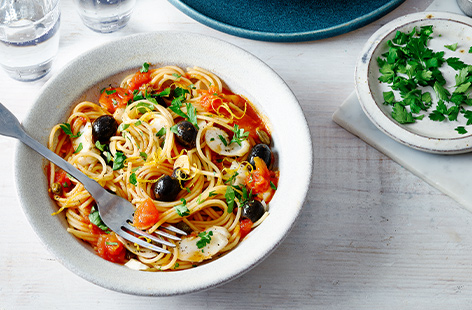 Packed with storecupboard saviours, this quick and easy dish adds flaky white fish to a traditional Italian puttanesca