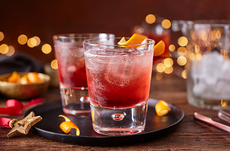 An Italian Christmas twist on a classic negroni, this bitter Campari cocktail switches traditional gin for prosecco.