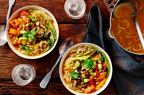 Warm up with this easy butternut squash ramen recipe. Whizz up roasted squash with miso paste sesame oil to make a perfectly balanced broth before topping with pak choi, mushrooms, spring onion, coriander and toasted squash seeds. Use the roasted squash to make our crispy squash and sage gnocchi recipe the next day.