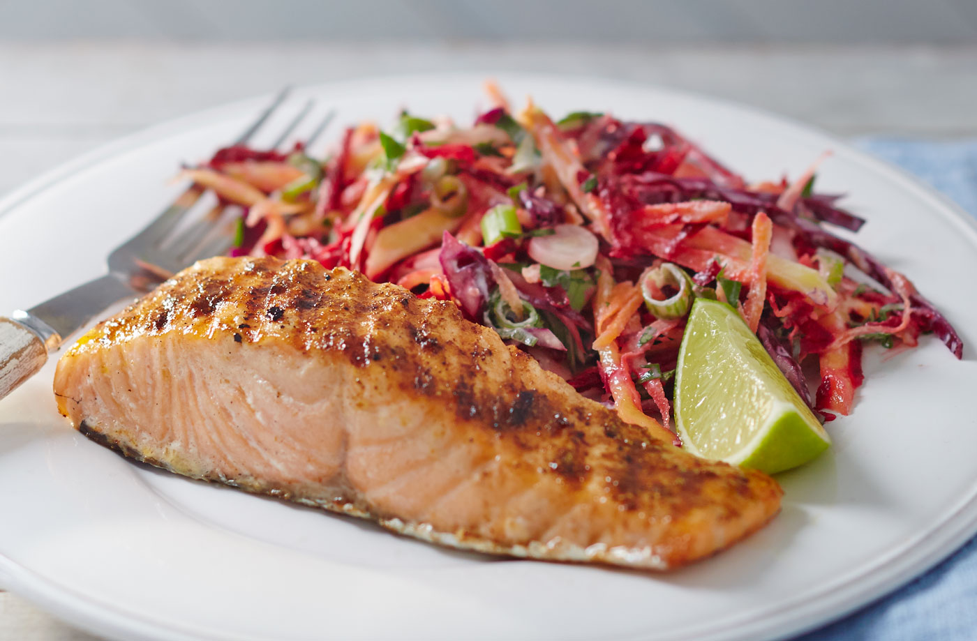 Jerk salmon with tangy mango slaw recipe
