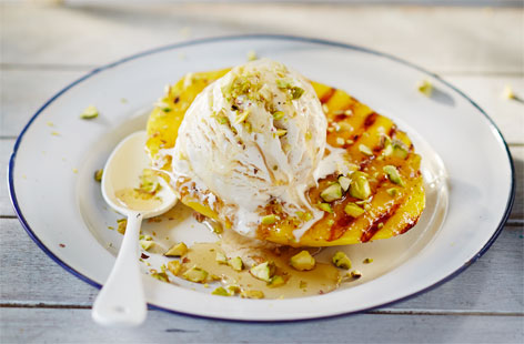 Mangos are deliciously refreshing and taste wonderful topped with pistachios and honey. Barbecuing mango cheeks really brings out a gorgeous smoky and peppery flavour - serve with a dollop of ice cream for a perfect summer dessert