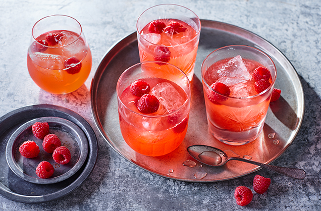 Raspberry whisky sour cocktail