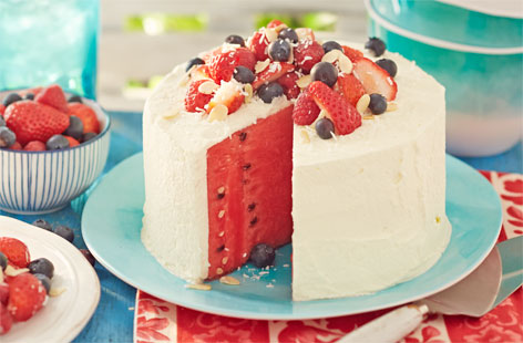 This watermelon ‘cake’ – with cream, mixed berries, flaked almonds and coconut – makes for a refreshing yet indulgent treat.