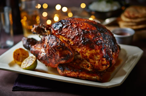 For a mild and creamy aromatic way with a whole bird, try this dish served with rice and mango chutney – delicious!