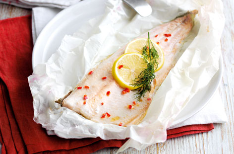 Baking fish in paper locks in moisture and enhances its delicate flavours. Try this recipe with any white fish, its complemented with a crunchy walnut, beetroot and rice salad for a healthy midweek meal