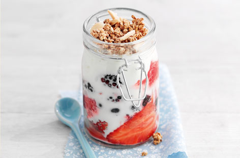 Once you start making your own granola, you won't look back. Apple juice, honey and ground cinnamon are mixed with oats and almonds. Serve with seasonal berries of your choice and yogurt mixed with honey.