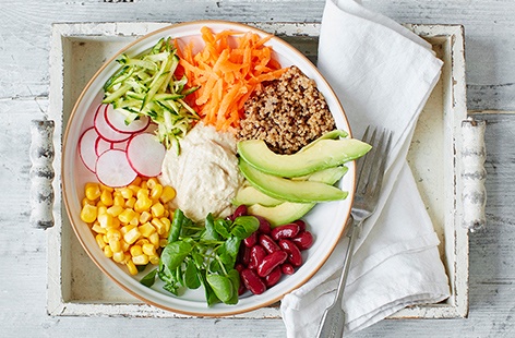 Packed with a medley of vegetables, nourishing quinoa and creamy houmous, this colourful salad is guaranteed to brighten up weekday lunchtimes