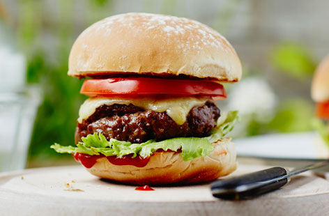 The classic burger is an all-time BBQ favourite! This super easy burger recipe gives you delicious burger patties, packed with onions, herbs and seasoning for extra flavour and juiciness, that are perfect for topping with cheese, lettuce and tomato