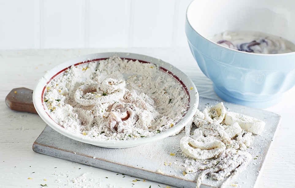 Coat the squid in flour