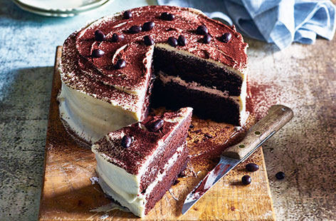 This easy coffee cake recipe pairs light chocolate sponge, infused with rich coffee syrup, with wonderfully fluffy marshmallow frosting. A creative baking idea that's best enjoyed with a steaming cup of fresh coffee