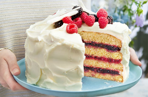 Sometimes a big and beautiful bake is in order. This four-layer sponge cake is filled with gorgeous jam and fresh fruit, but it's the mascapone and Grand Marnier icing that will have you reaching for a second slice.