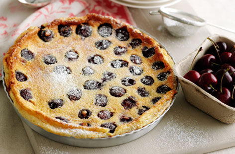 Try this French-inspired baked dessert with layers of cherries and a creamy batter  