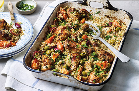 A medley of ras el hanout, couscous, onions and carrots, this Middle Eastern-inspired chicken tagine traybake is a fragrant and filling way to get the most out of family meal time.