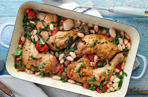 This gorgeous tray bake couldn't be easier to put together: Succulent chicken legs, baked with garlic, cannellini beans, tomatoes, chilli and stock. Fresh basil and lemon zest sprinkled over just before serving lift the flavours.