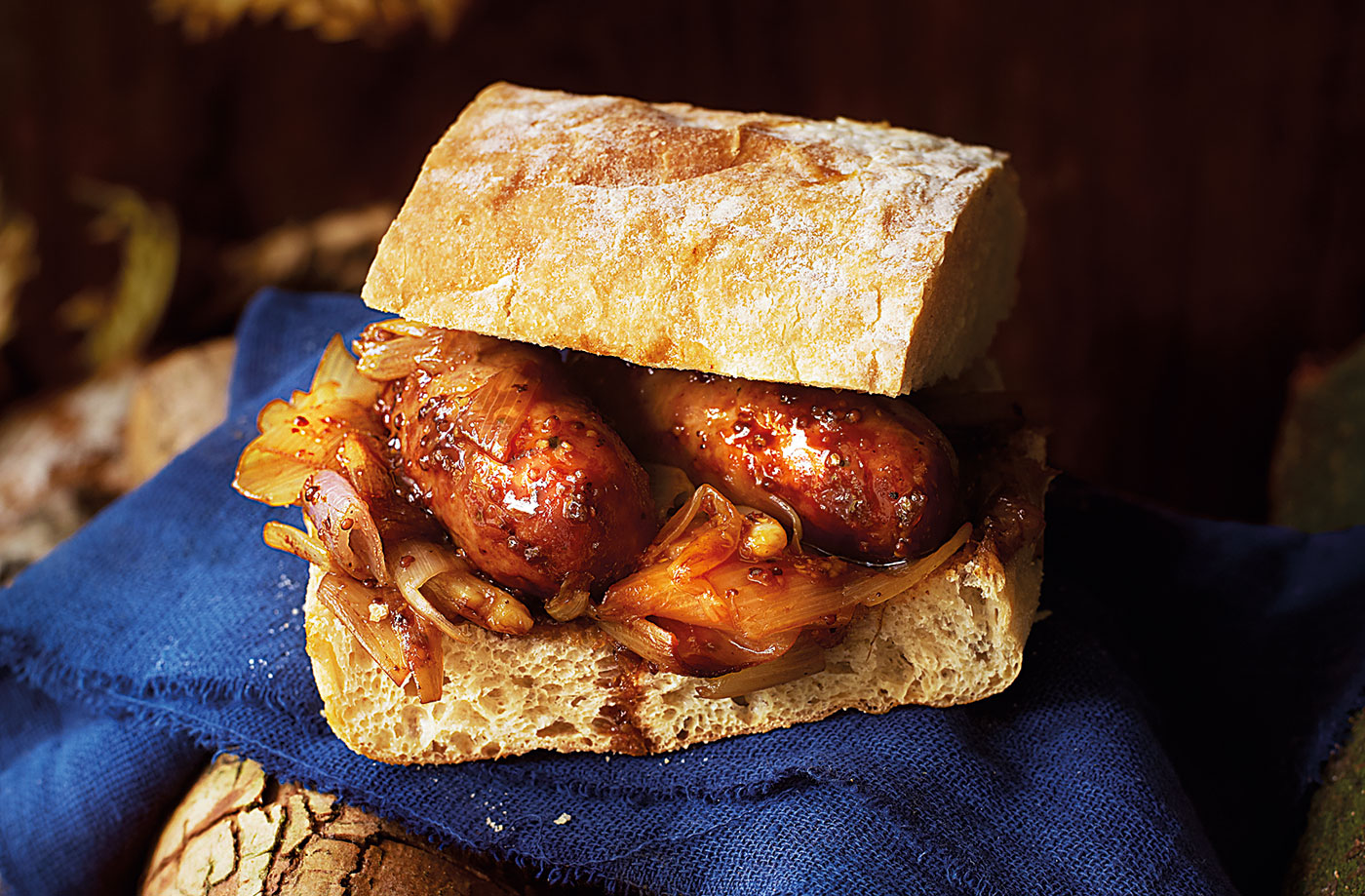 Cider-glazed hot dogs recipe