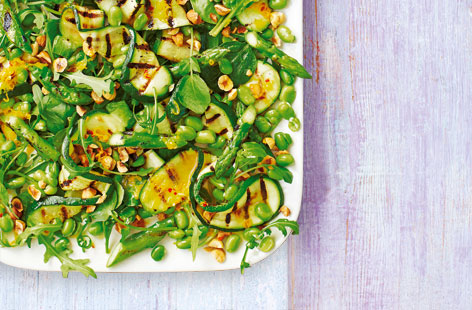 Hazelnuts provide the textural crunch in this fresh and vibrant side salad while seasonal courgette and asparagus do most of the heavy lifting. A bright orange and chilli dressing, liberally drizzled on top, is what ties this summer dish all together.