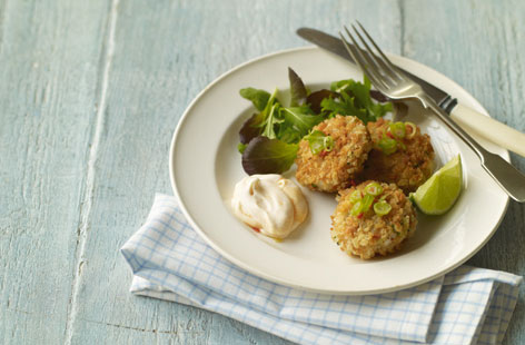 These crab cakes are luxurious yet surprisingly easy to prepare: dressed crab is mixed with mashed potato, flavoured with chilli, pepper, parsley and spring onions, then coated with breadcrumbs and fried. Serve with mayonnaise and a green salad for a delicious starter or light main course.