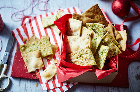 These Christmas crackers may not go bang, but they're certainly packed with flavour! Whether you opt for rosemary and sea salt, chilli and fennel, or pesto and Parmesan, these crisp, moreish crackers make the ideal Christmas edible gift idea