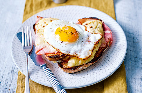 For a classic French breakfast recipe, give this delicious croque madame a try. Slices of crisp, toasted sourdough, layered with fresh ham, Gruyère cheese and creamy béchamel sauce, all topped off with a perfectly cooked egg
