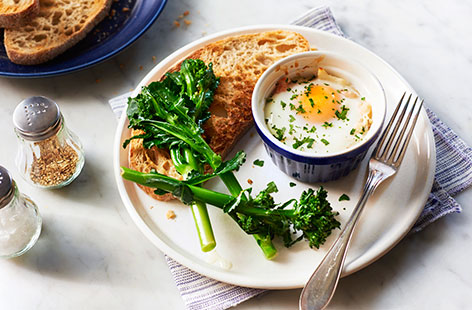 Give classic fish pie ingredients a tasty twist by sitting baked eggs on top of a gorgeous mixture of fragrant smoked haddock, cream, prawns and mustard