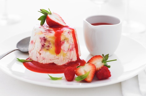 Eton Mess is summertime in a bowl. Juicy berries, sweet meringue, whipped cream and a delicious tangy sauce, this is a traditional dessert that is so simple to make, the hard part will be waiting for it to set.