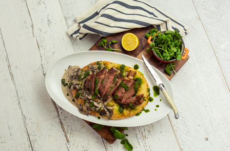 With luxurious creamy mushrooms, fragrant and fresh chimichurri dressing and pan seared sirloin, this flatbread is perfect if you’re looking for new ideas on steak night.