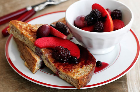 French toast makes for an excellent start to any day. Ready in minutes, here apples and frozen blackberries are lightly stewed whilst slices of bread, soaked in whisked egg and millk are fried until golden brown.