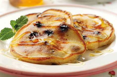 Start the day with these fluffy fruit pancakes. Eggs and buttermilk are whisked into self raising flour, then the batter is sweetened with honey and blueberries. Swap the flour with wholemeal self raising flour for an extra healthy take.
