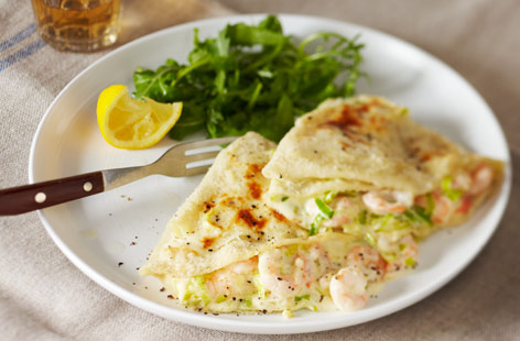 Don't save pancakes just for Pancake Day - try these prawn-stuffed pancakes for dinner any night of the week. Filled with creamy leeks and prawns, these light pancakes are also gluten-free.